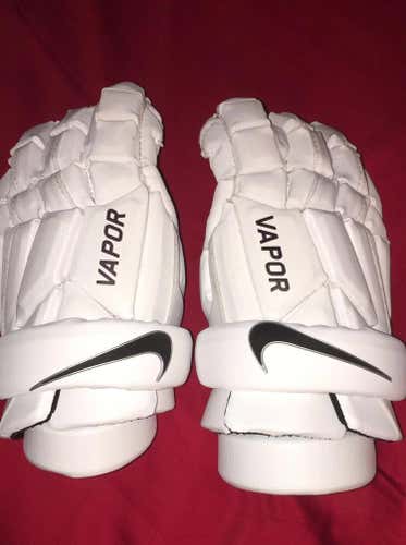lightly used nike vapor gloves 13”