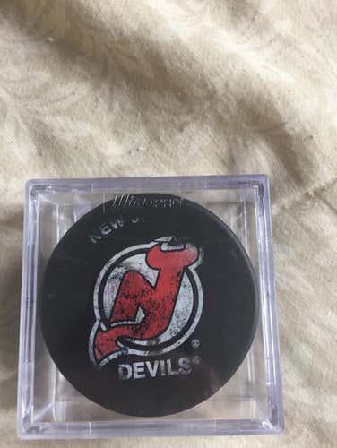 Game Used Devils Puck + Case