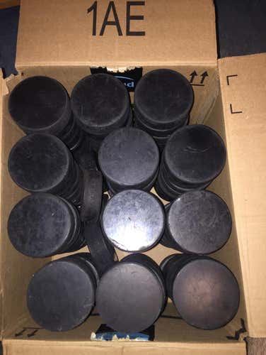 100 Hockey Pucks