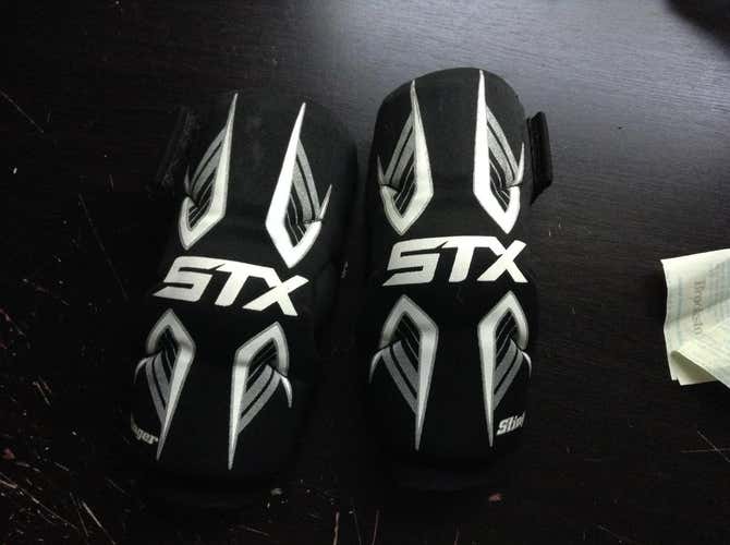 STX Stinger arm pads