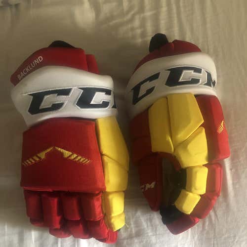 Red And Yellow CCM Calgary Flames Gloves