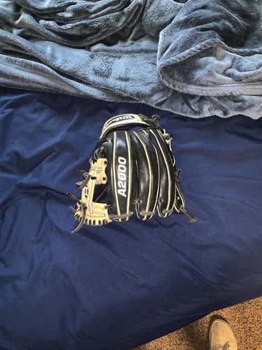 Wilson A2000 11.5. In Good Condition Just One String Ripped Off. Will Take Offers