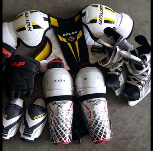 Youth hockey gear. Skates, gloves, elbow, shoulder, shin