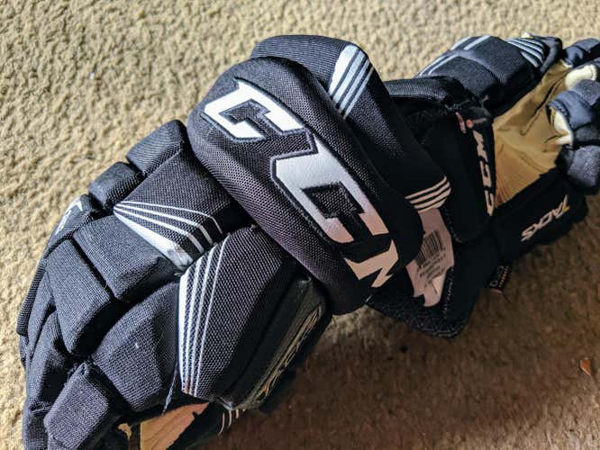 New CCM Super Tacks Gloves Junior