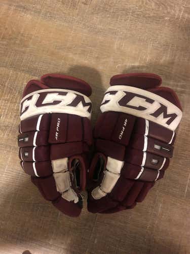 White & Maroon CCM 4 Roll Pro’s