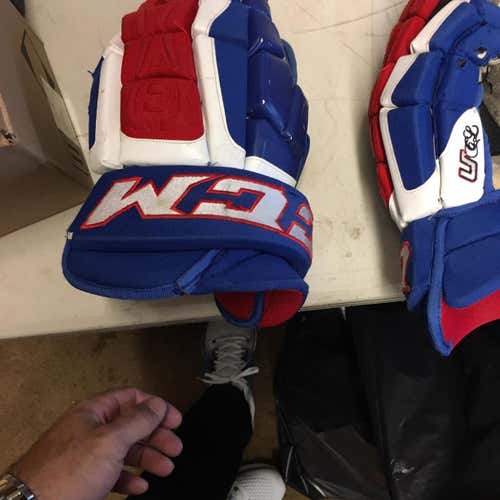 Used Red White And Blue CCM Crazy Light Gloves