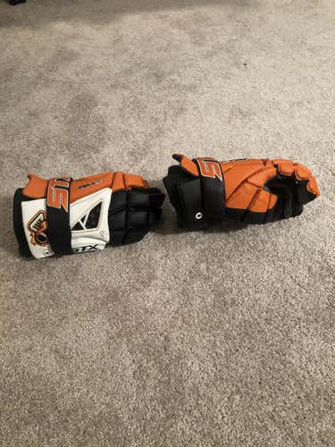 Used STX Cell IV Atlanta Blaze Gloves