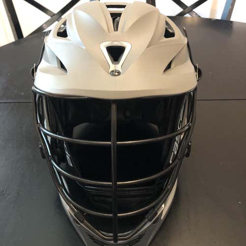 Lightly used Cascade R Helmet. Matte Grey Shell, Silver Jaw, Black Cage, Black Chin Strap