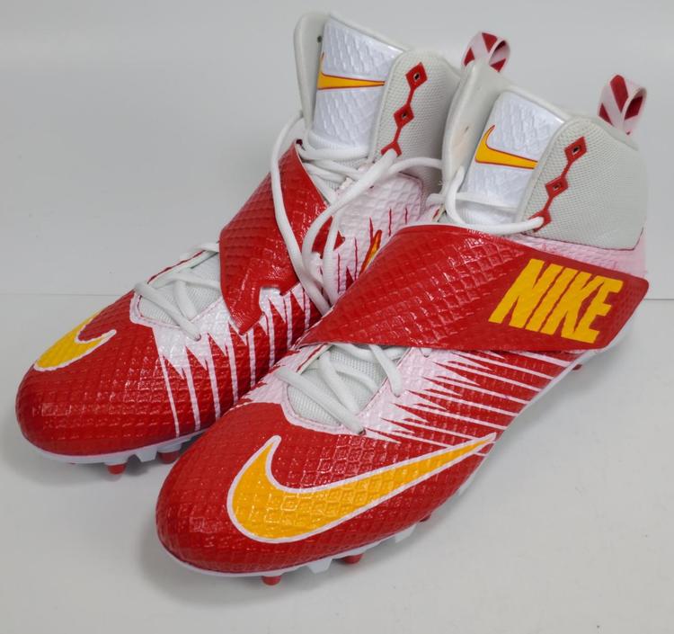 pink and yellow football cleats