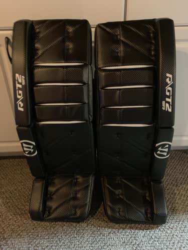 Warrior GT2 SR. Goalie Leg Pads Black Weave used once 33 + 1.5