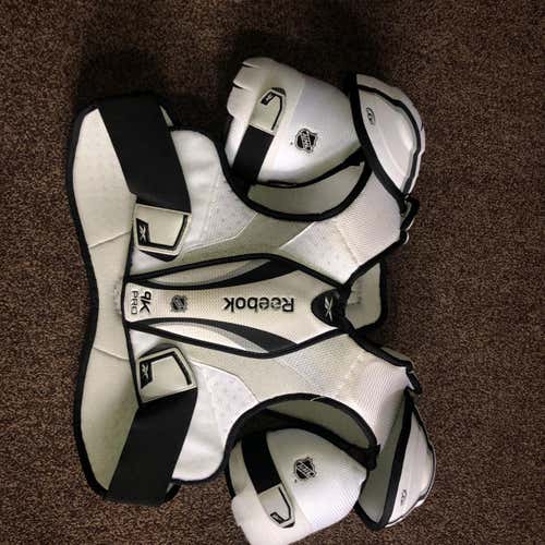 New 9K Shoulder Pads Senior Pro Stock