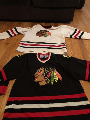 Pair Of Blackhawks Jerseys