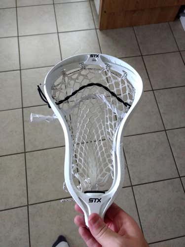 STX Ultra Power strung with throne fiber 2 mesh and strings.