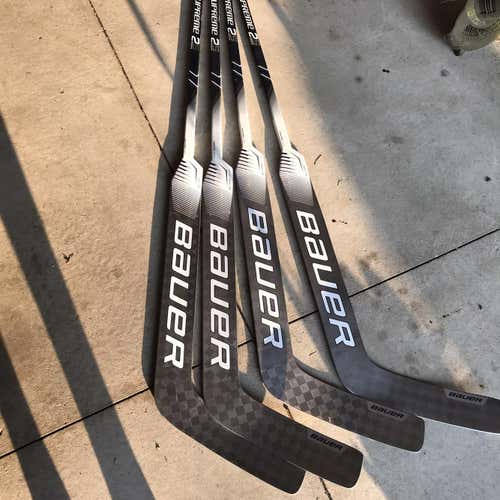 2 New Supreme 2S Pro Goalie Stick Custom Grip