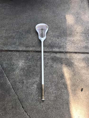 Warrior Evo Warp NEXT on a Stringking Metal
