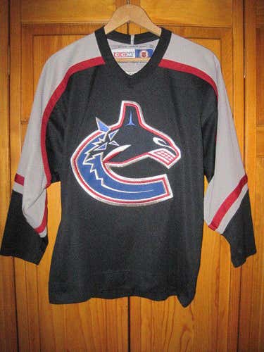 Vancouver Canucks hockey jersey kids boys L/XL CCM blue