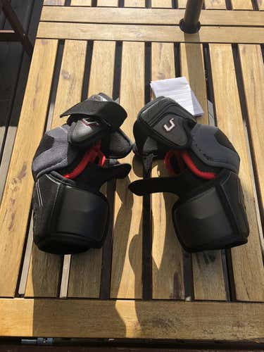 New CCM U+ CL Elbow Pads Senior Pro Stock