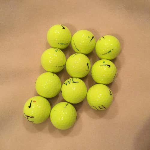 11 Used Yellow Nike White Golf Balls