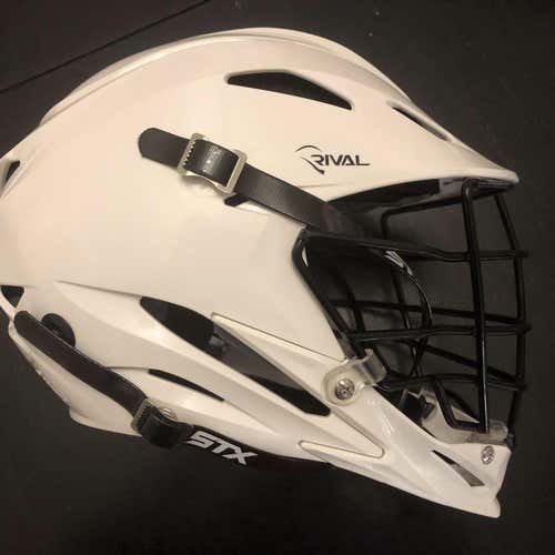 PreOwned STX Rival Helmet Adult. White Shell. Black Cage And Chinstrap. Size Small/Medium.