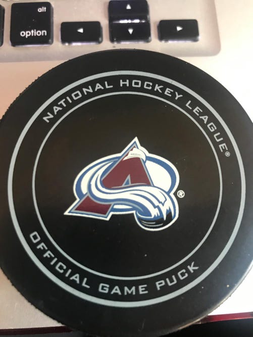 New Sher-Wood GAME PUCK FROM THE  COLORADO AVALANCHE