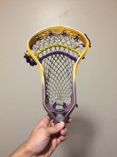 Dyed Maverik Kinetik Head purplish and yellow