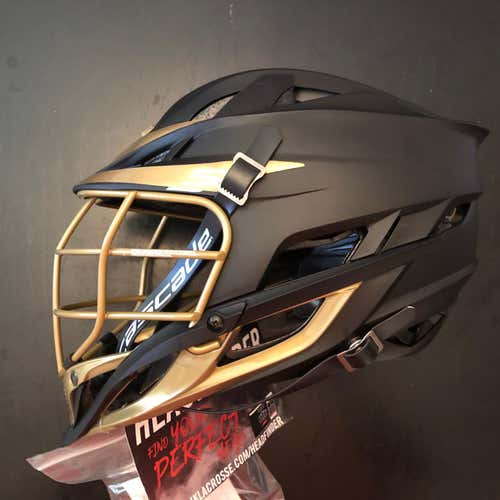 BNWT Cascade S Youth Helmet. Matte Black Shell, Old Gold Cage, Old Gold Jaw/chin/ Visor Decal