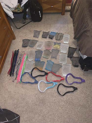Lots Of Lacrosse Mesh And String And Heads