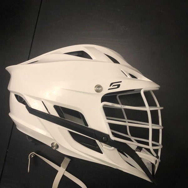 Used Cascade S Helmet. White Shell, White Cage, White chin And Strap. Adult