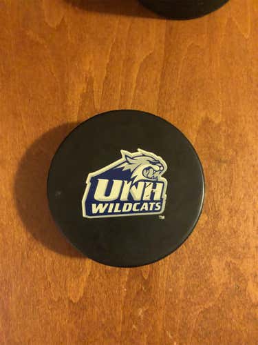 Game Used UNH Hockey Puck Hockey East.