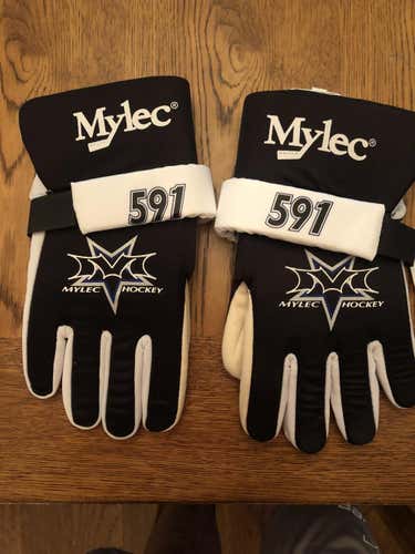 Brand New Mylec Adult Medium hockey gloves