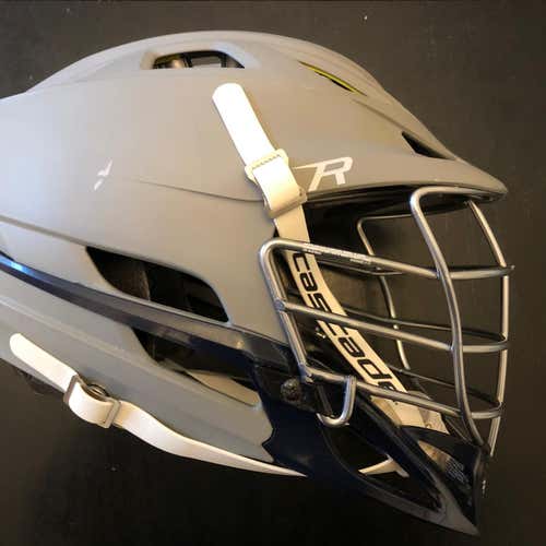 Used Cascade R Helmet Adult. Matte Gray Shell. Blue Chin/jaw. White Chin Strap.