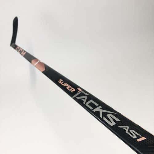 Used Pink Right Handed CCM Super Tacks AS1 | 65 Flex | P80 Curve | Grip | RH90