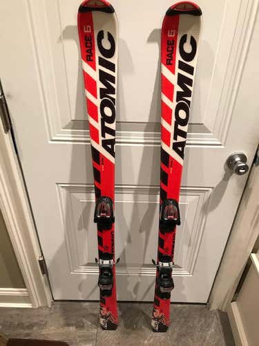 Atomic (140 cm) Unisex Skis With Marker Bindings & Poles