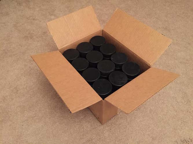 96 Pack of Ice Hockey Pucks in Excellent Condition