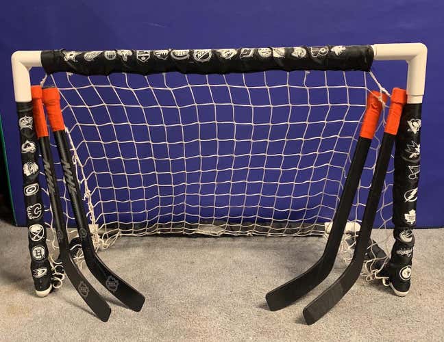 2 Mini Hockey Nets and 4 Mini Hockey Sticks