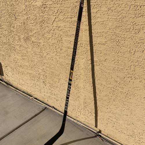 New Supreme 2S Pro Hockey Stick Mid Intermediate