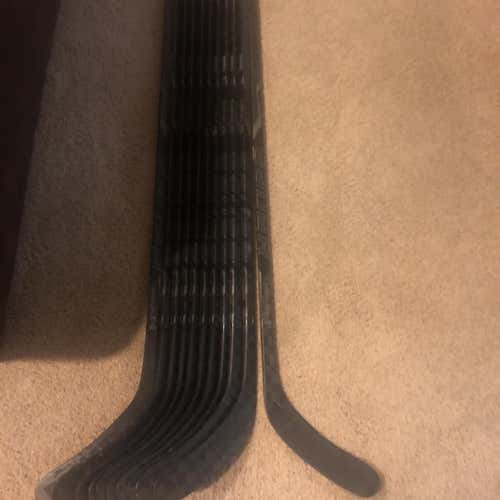 11 Pack  Nexus 1000 Hockey Stick Mid Pro Stock