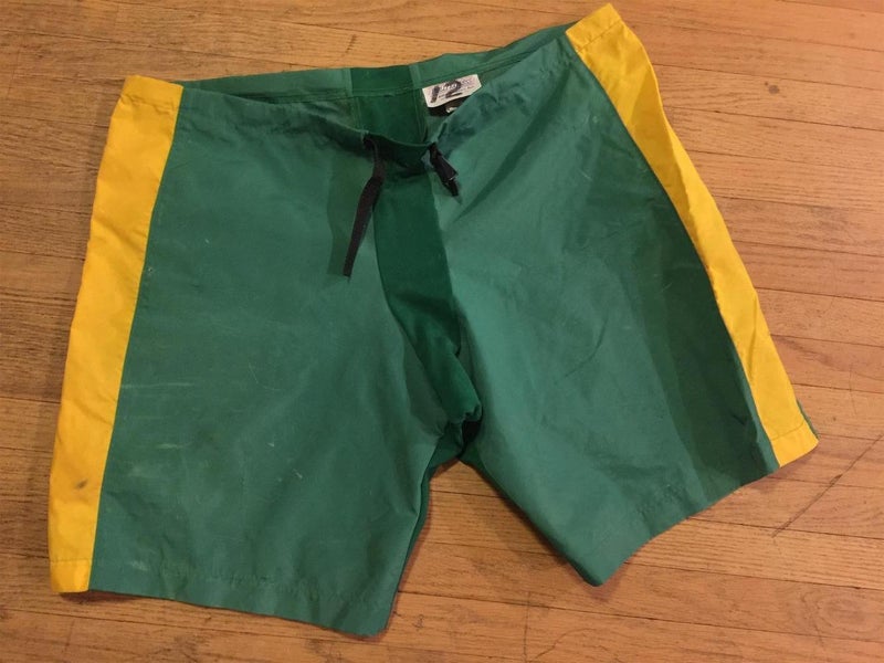 GREEN AND GOLD HOCKEY PANT COVER UPS