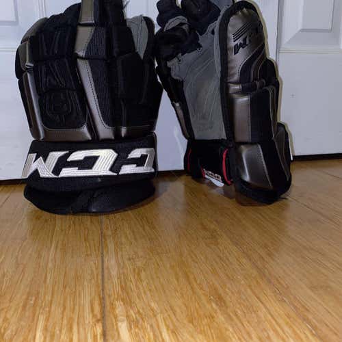 Black Senior CCM U+ Crazy Light Gloves 15"