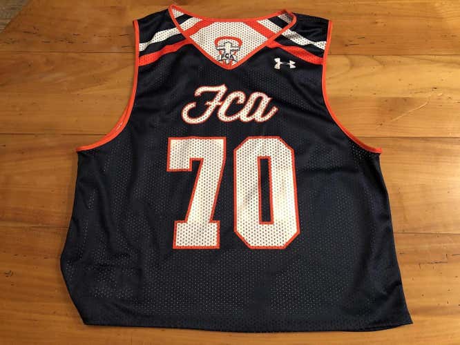 FCA team issued pinnie white and blue