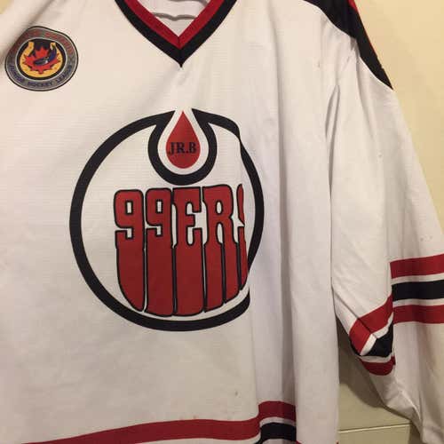 BRANTFORD 99ERS WHITE   GAME WORN JERSEY GOJHL #4