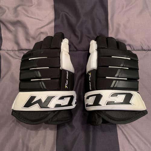 Used CCM Tacks 4 Roll Pro Gloves 14"