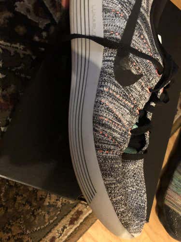 Gray Adult Men's 11 (Women's 12) Nike Shoes