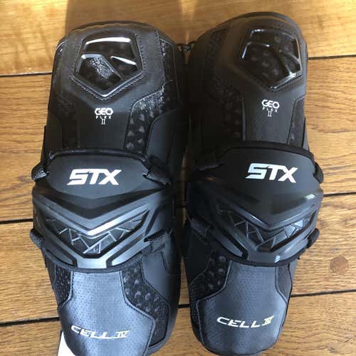 Brand New With Tags STX Cell IV Arm Guards. Black. Large