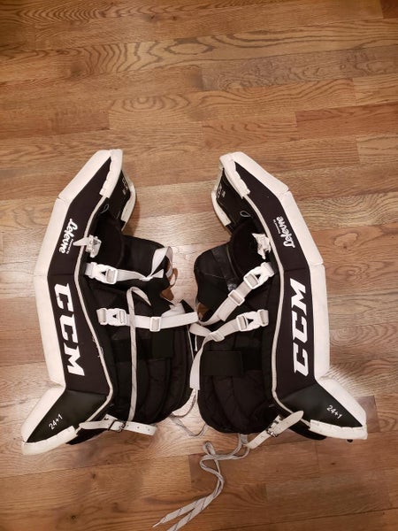 White Junior 24" CCM Extreme Flex E3.5 Goalie Leg Pads