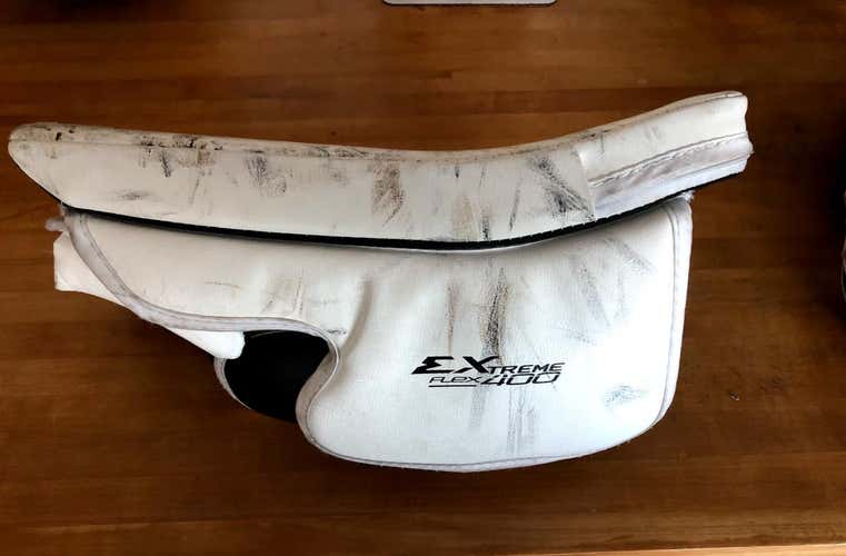 White and Black Junior CCM Extreme Flex 400 Blocker