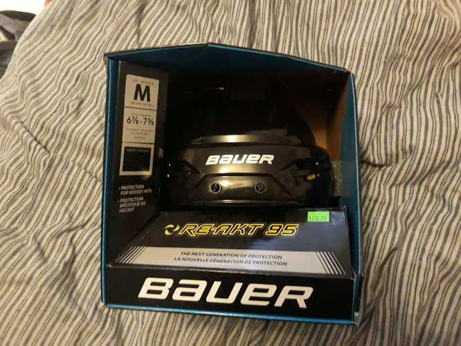 Black Medium Bauer Re-Akt 95 Helmet, used one time