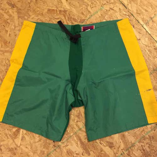 GREEN AND GOLD HOCKEY  PANT COVER UPS SIZE MEDIUM