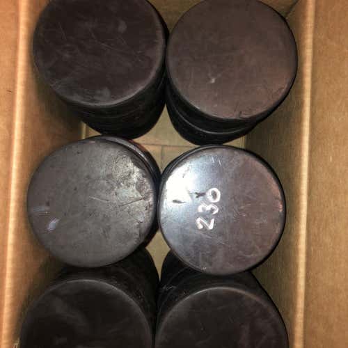 35 Hockey Pucks