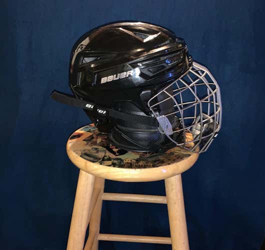 New Bauer Re-Akt 150 Helmet With Used Cage